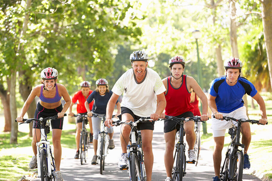 A group of casual cyclists bike riding